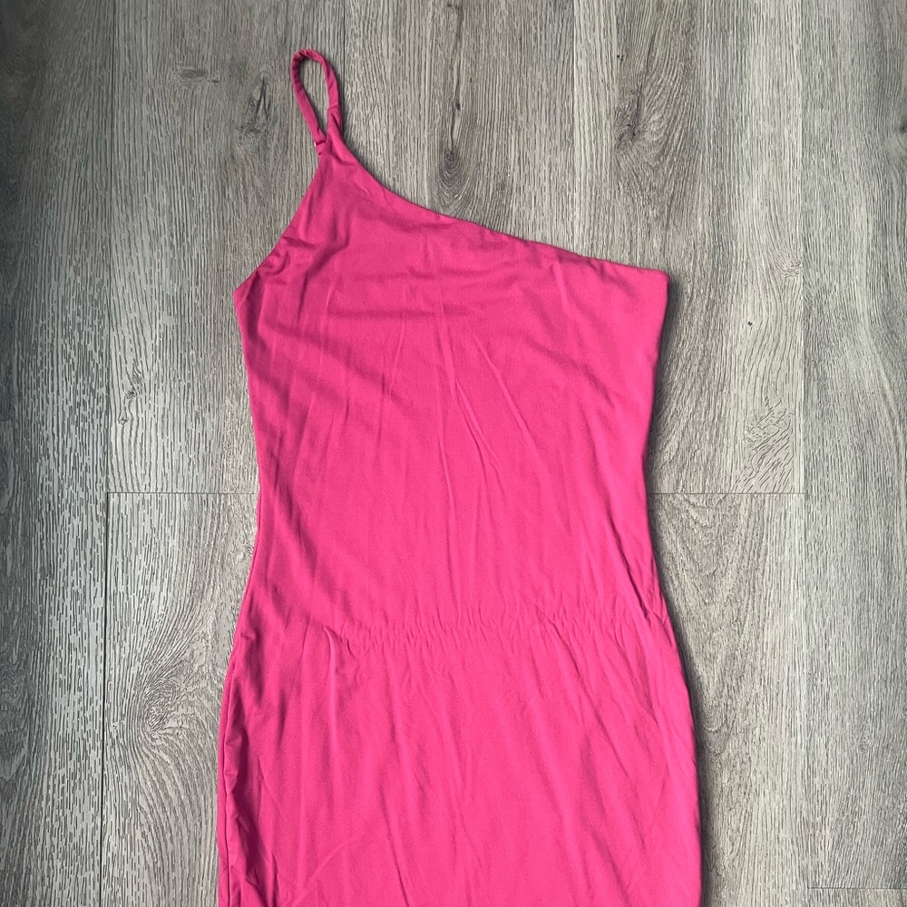 Pink, one shoulder, body-con dress.